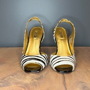 Report Signature sling backs